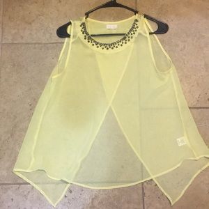 Yellow open back tank